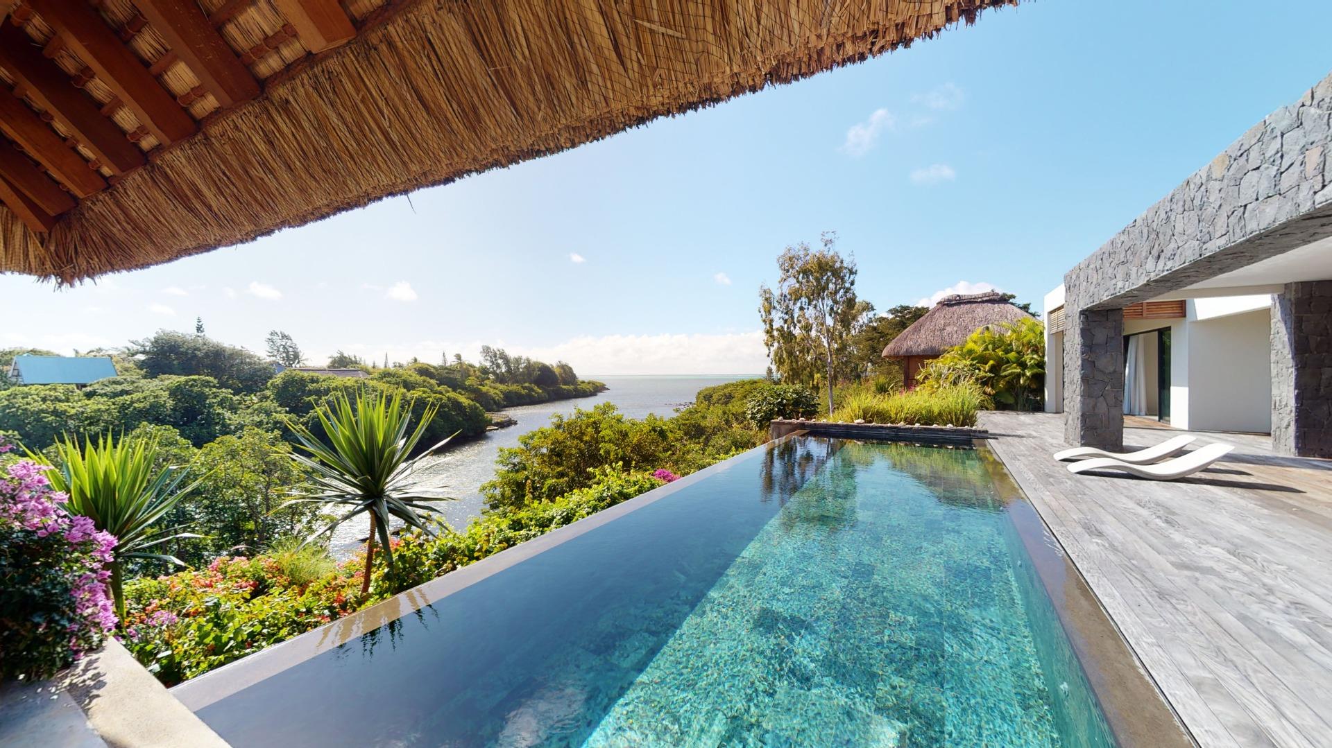 Discover the epitome of coastal living in this remarkable pr