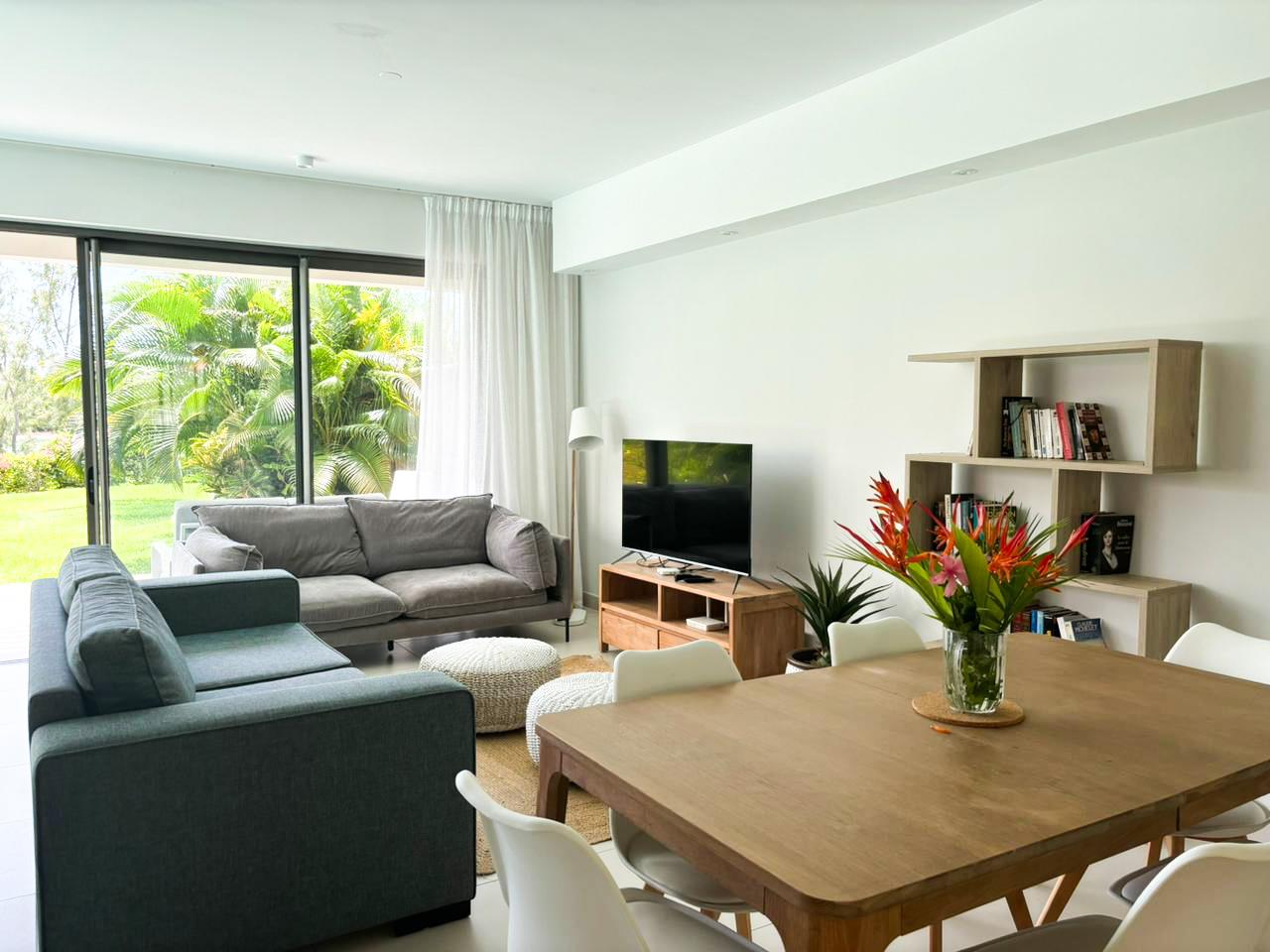 Seafront duplex surrounded by beautiful gardens